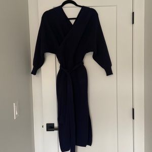 Sweater dress, figure flattering.  Quality weight knit.